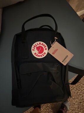 Fjallraven Kanken Mini Black Backpack with Red Logo